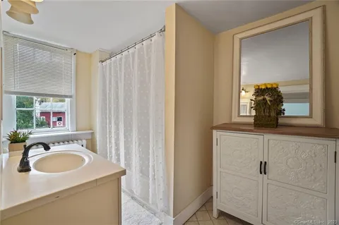 a view of a sink and a mirror