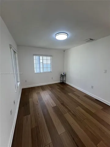 a bathroom with a sink and vanity