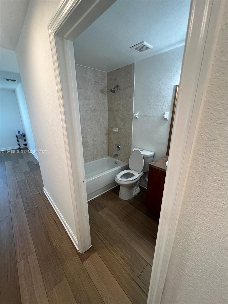 12254 Southwest 217th Street Miami, FL 33170 - Photo 8 of 40 a bathroom with a sink and a mirror