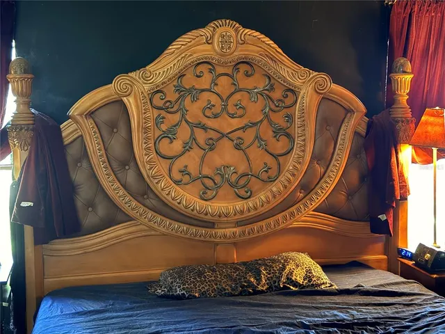 a view of a house with a wooden floor and a chair