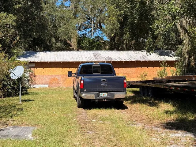 a view of a lake with a car parked