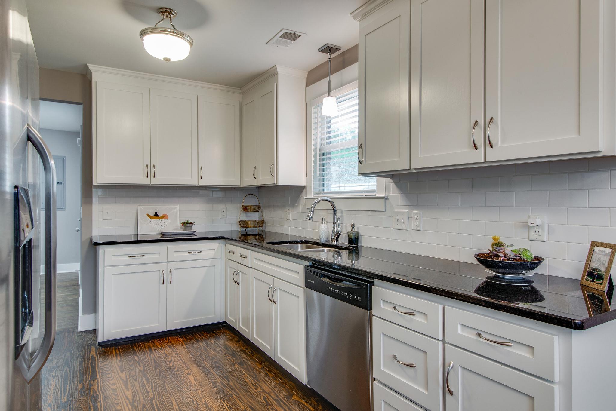 2300 Porter Road Nashville, TN 37206 - Photo 13 of 30 Plenty of counter space and cabinets. We don't even have all the cabinets full there's so much storage!