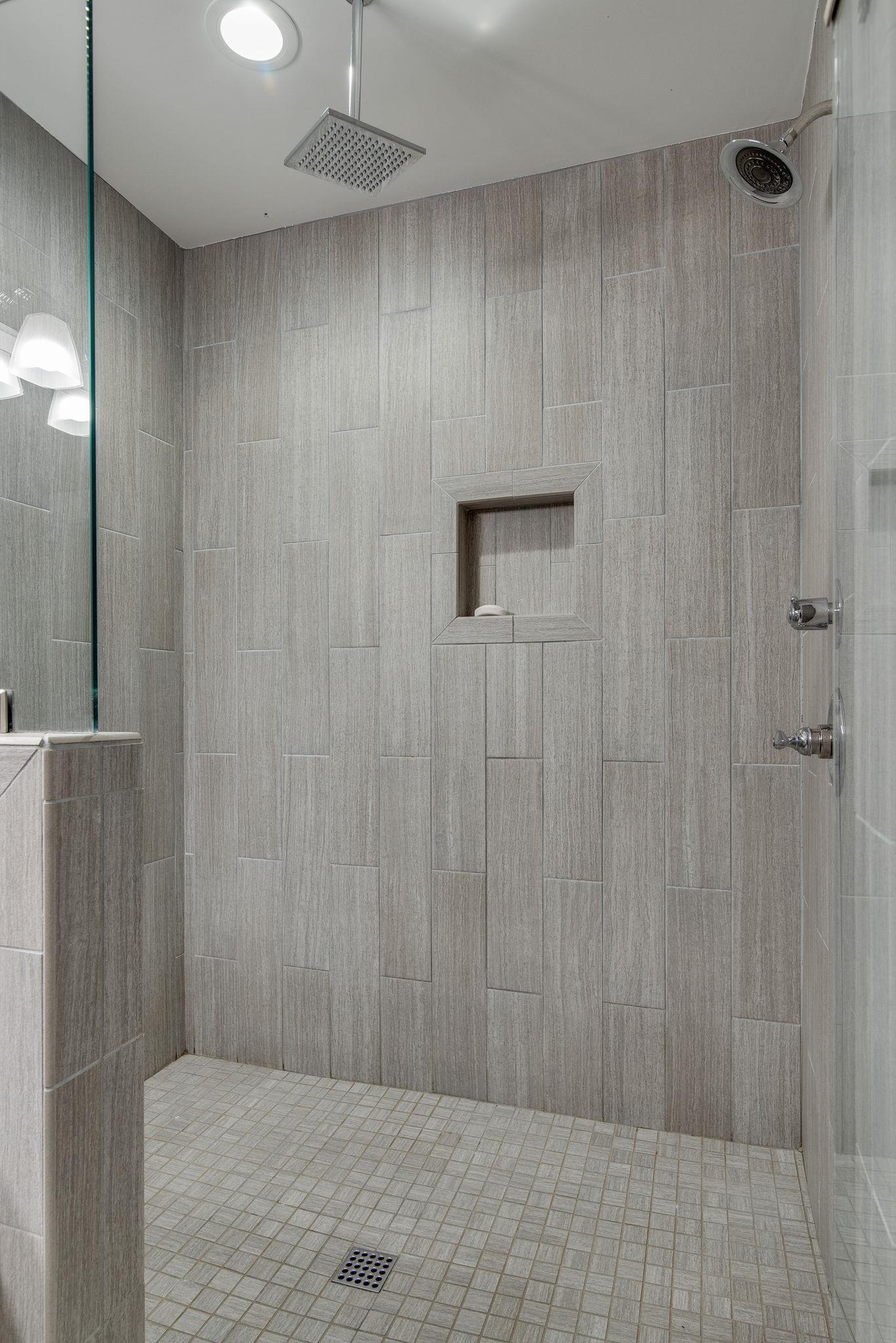 2300 Porter Road Nashville, TN 37206 - Photo 20 of 30 Master shower is HUGE! Two shower heads and tiled top to bottom.
