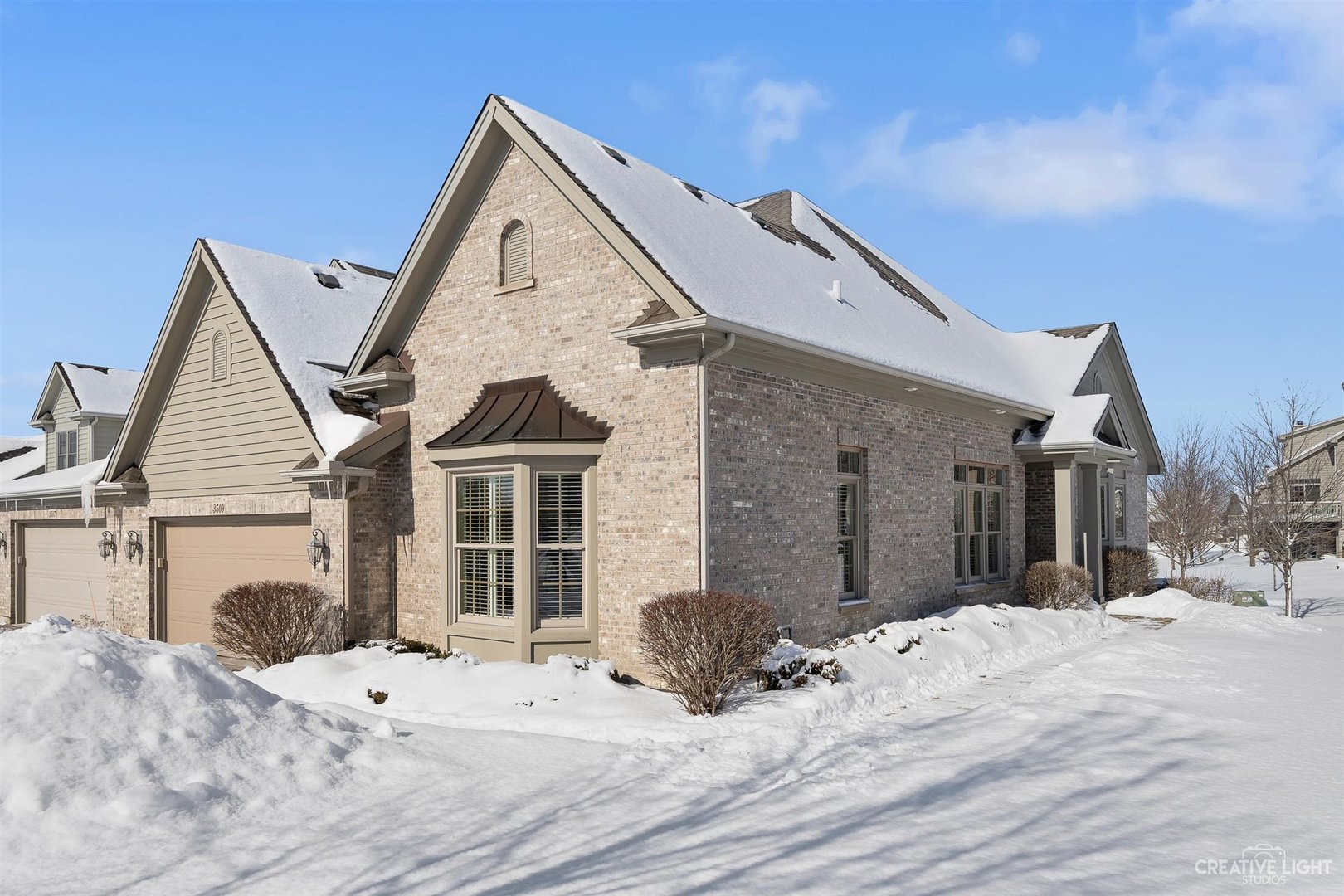 3509 Ridge Pointe Drive Geneva, IL 60134 - Photo 1 of 39 a front view of a house with a yard