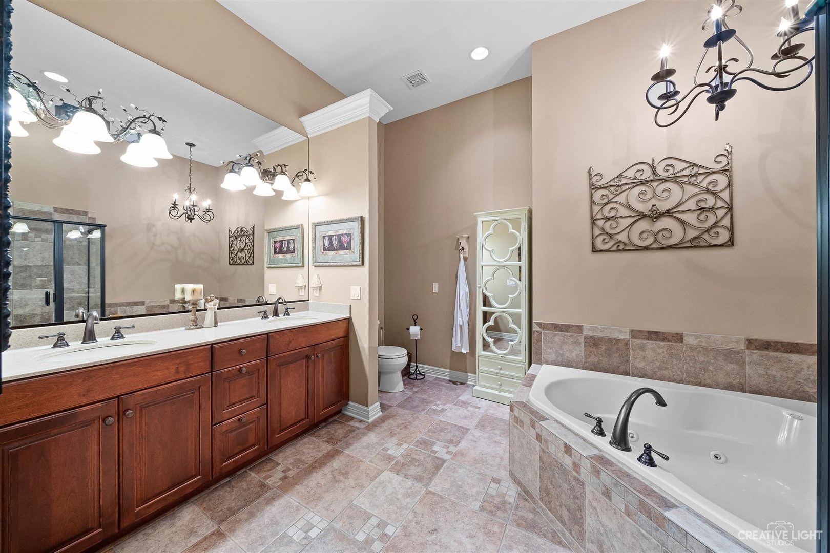 3509 Ridge Pointe Drive Geneva, IL 60134 - Photo 15 of 39 a bathroom with a bathtub mirror and sink