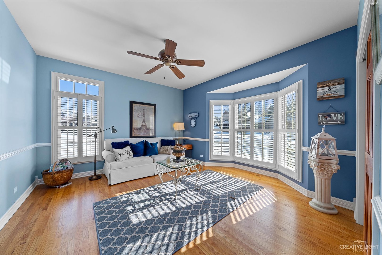 3509 Ridge Pointe Drive Geneva, IL 60134 - Photo 17 of 39 a living room with furniture large window and wooden floor