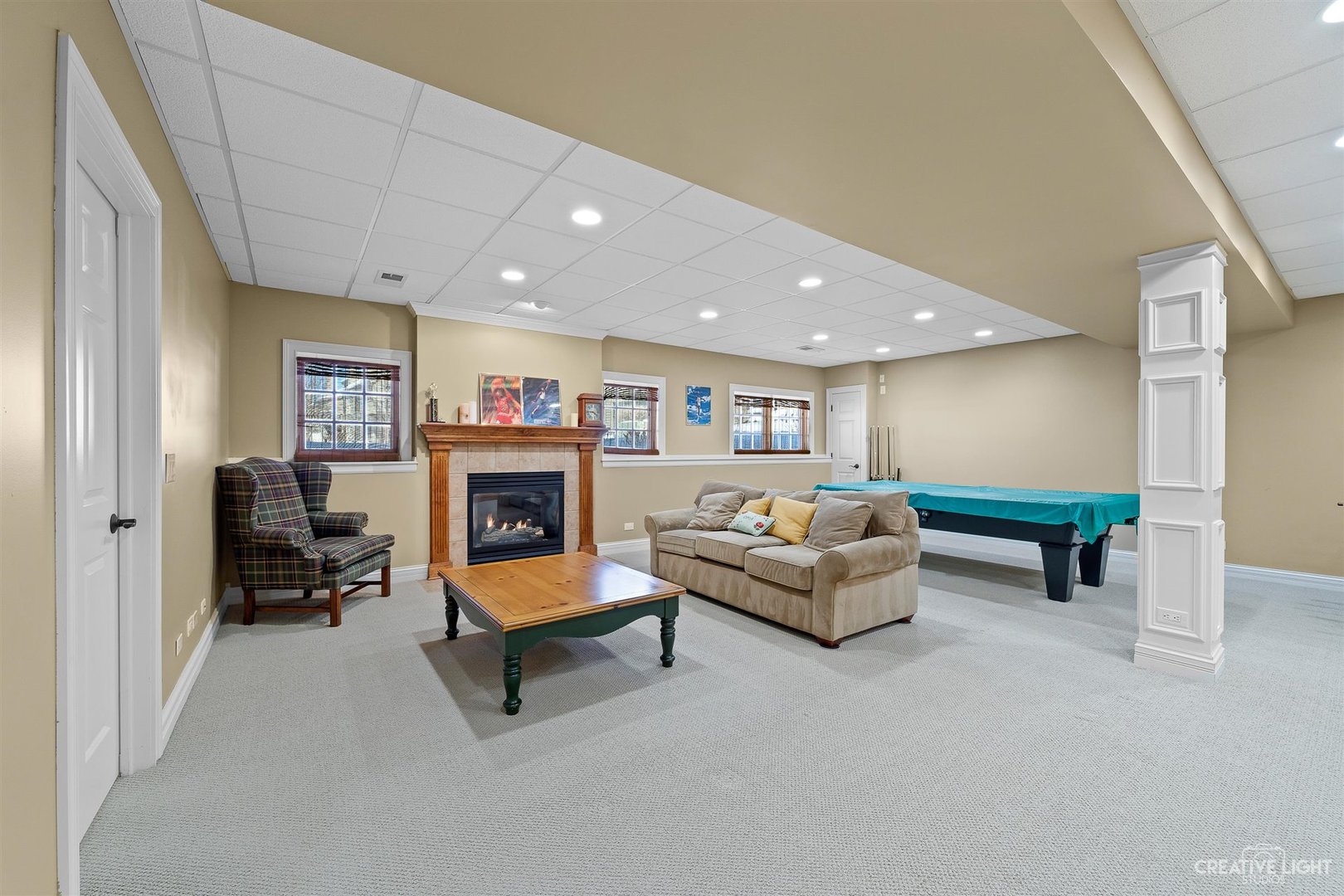 3509 Ridge Pointe Drive Geneva, IL 60134 - Photo 23 of 39 a living room with furniture and a fireplace
