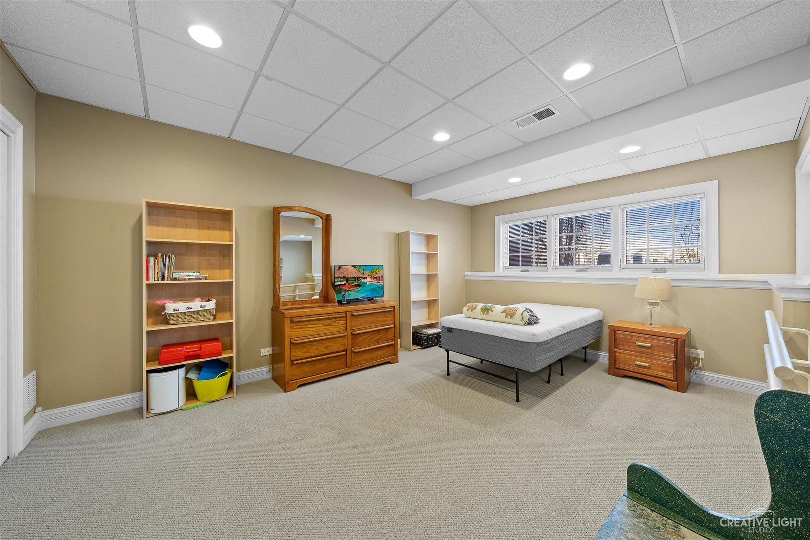 3509 Ridge Pointe Drive Geneva, IL 60134 - Photo 26 of 39 a spacious bedroom with a bed and a dresser