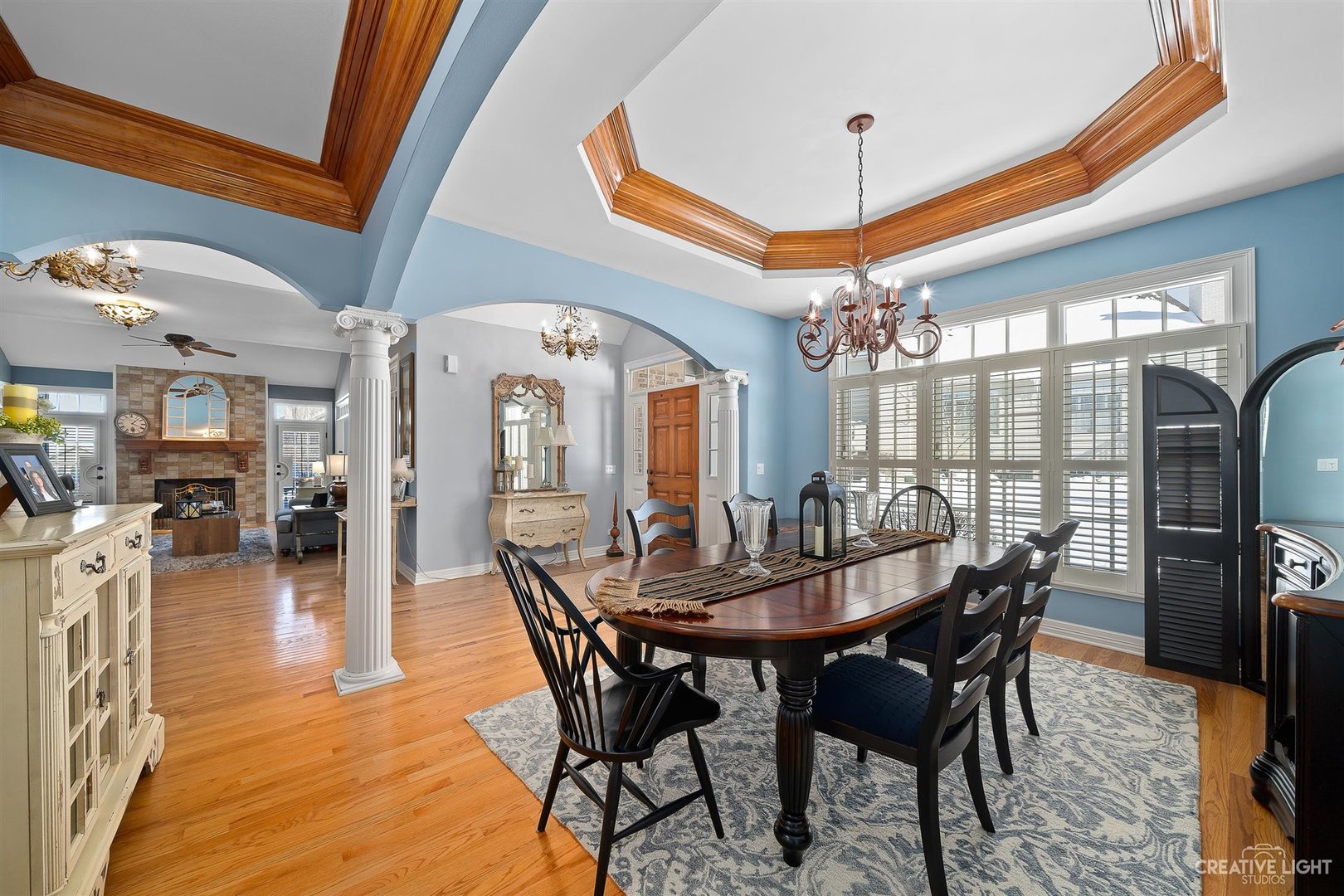 3509 Ridge Pointe Drive Geneva, IL 60134 - Photo 5 of 39 a view of a dining room with furniture window and wooden floor
