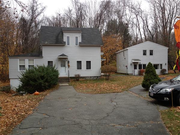 348 River Road Andover, MA 01810 - Photo 1 of 22 a view of a white house with a yard and large tree