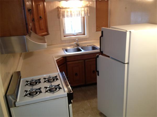 348 River Road Andover, MA 01810 - Photo 22 of 22 a kitchen with a refrigerator and a sink