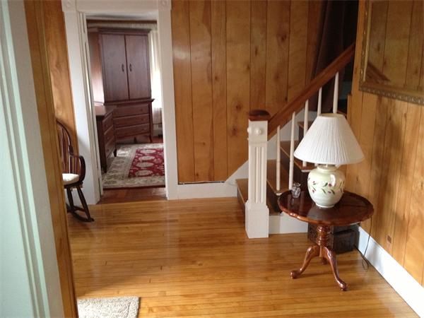 348 River Road Andover, MA 01810 - Photo 7 of 22 a view of an entryway with wooden floor