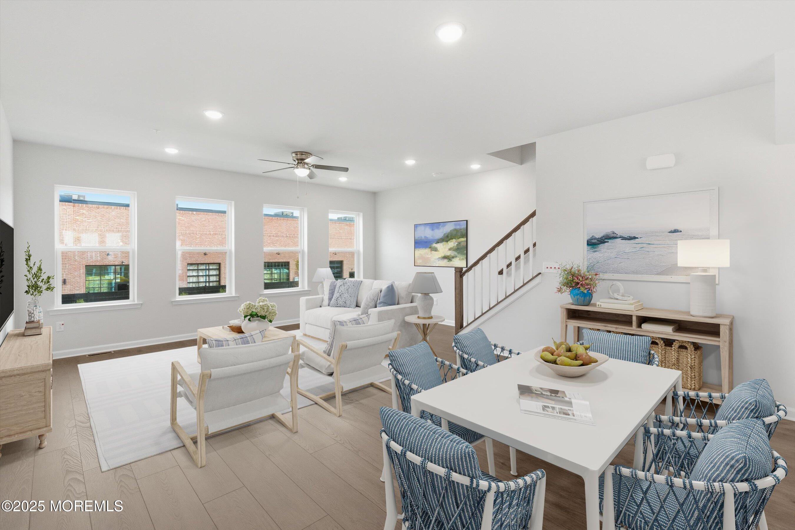 12 Barton Avenue Oceanport, NJ 07757 - Photo 12 of 22 a living room with furniture two window and a table