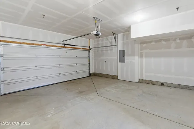 a view of a room with cabinet and mirrors