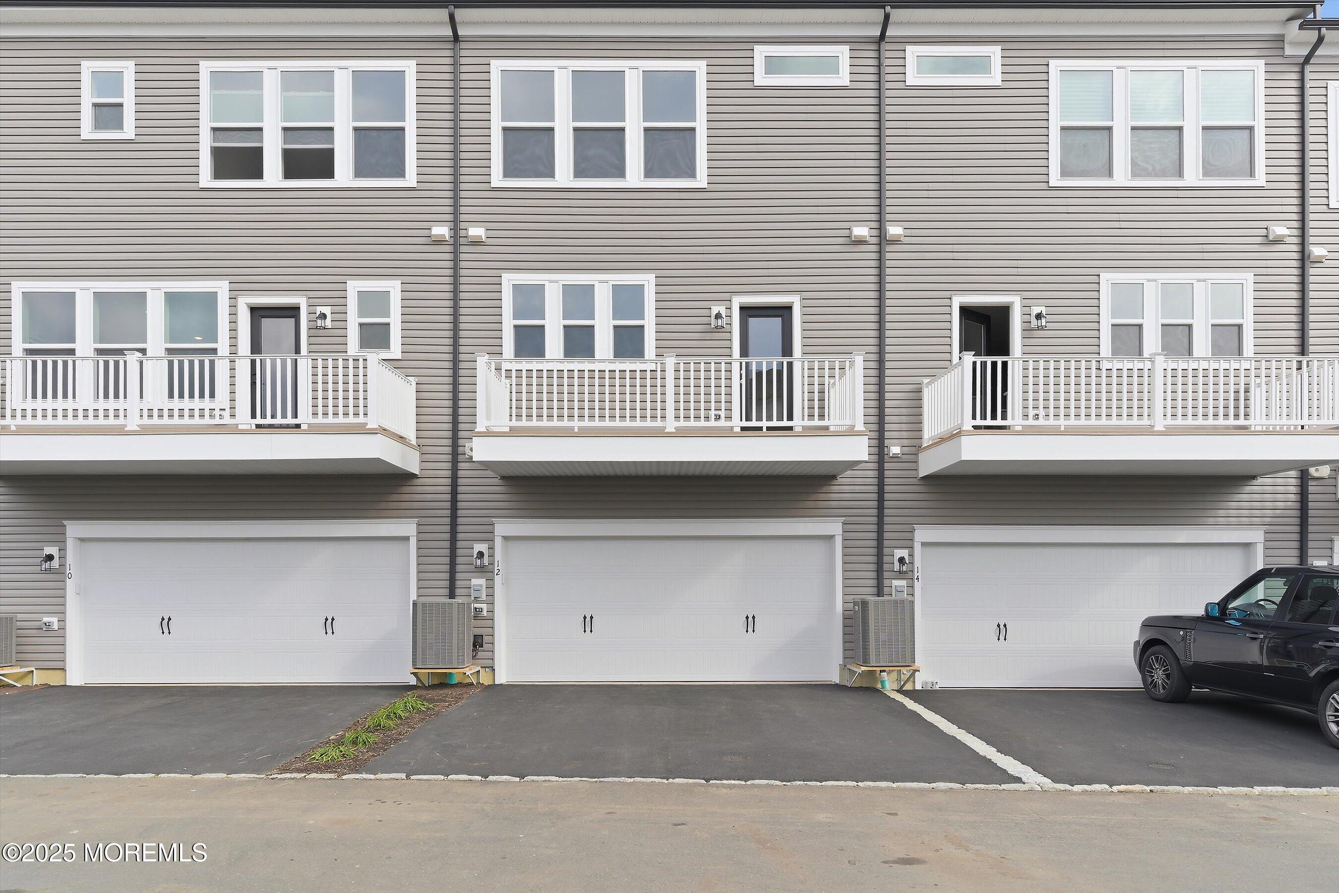 12 Barton Avenue Oceanport, NJ 07757 - Photo 20 of 22 a front view of a building with many windows