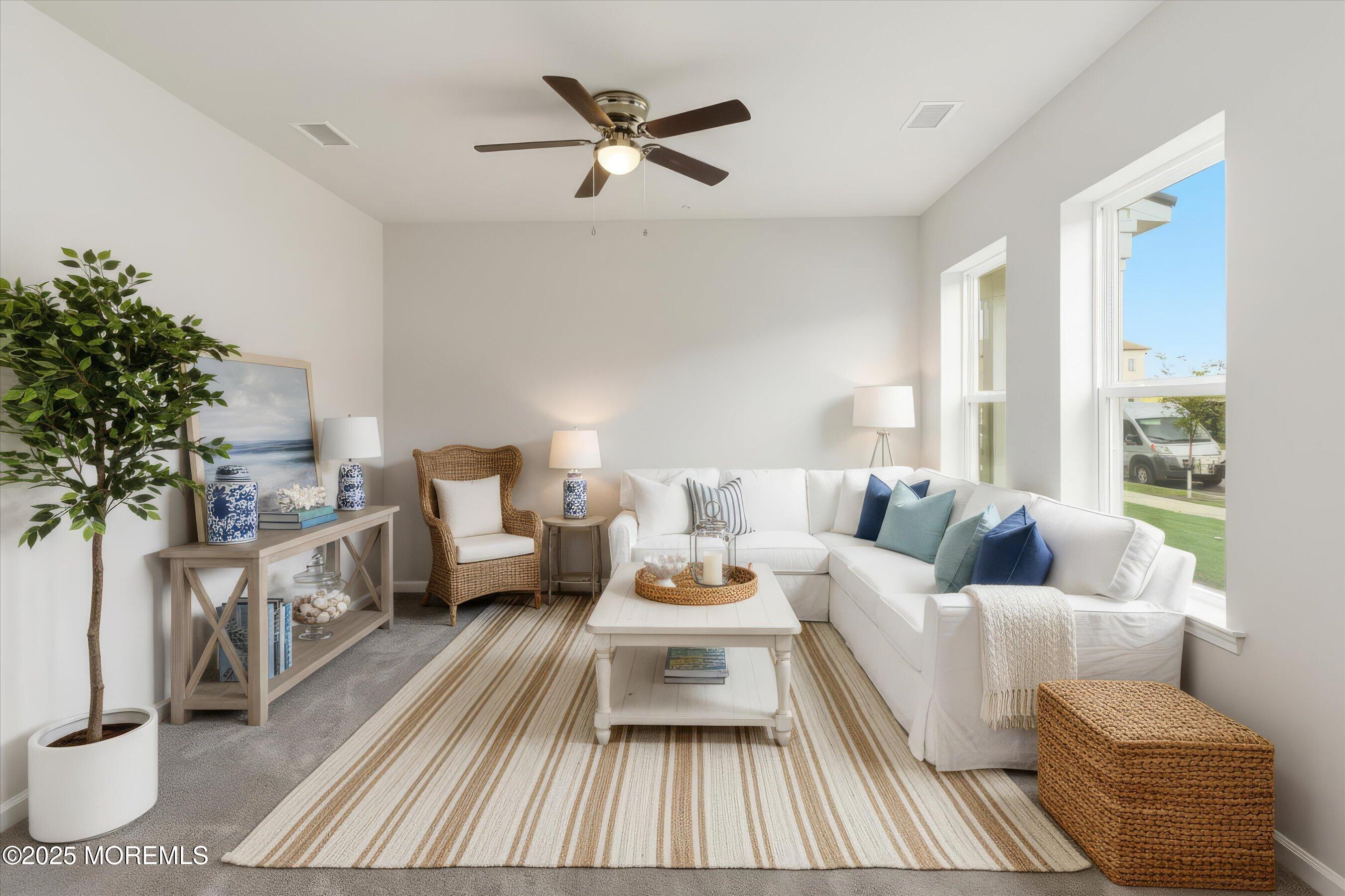 12 Barton Avenue Oceanport, NJ 07757 - Photo 4 of 22 a living room with furniture and a large window