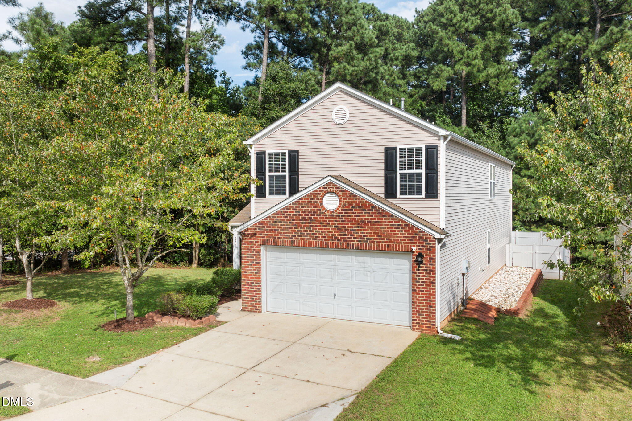 2701 Skybrook Lane Durham, NC 27703 - Photo 1 of 24 a front view of a house with a yard