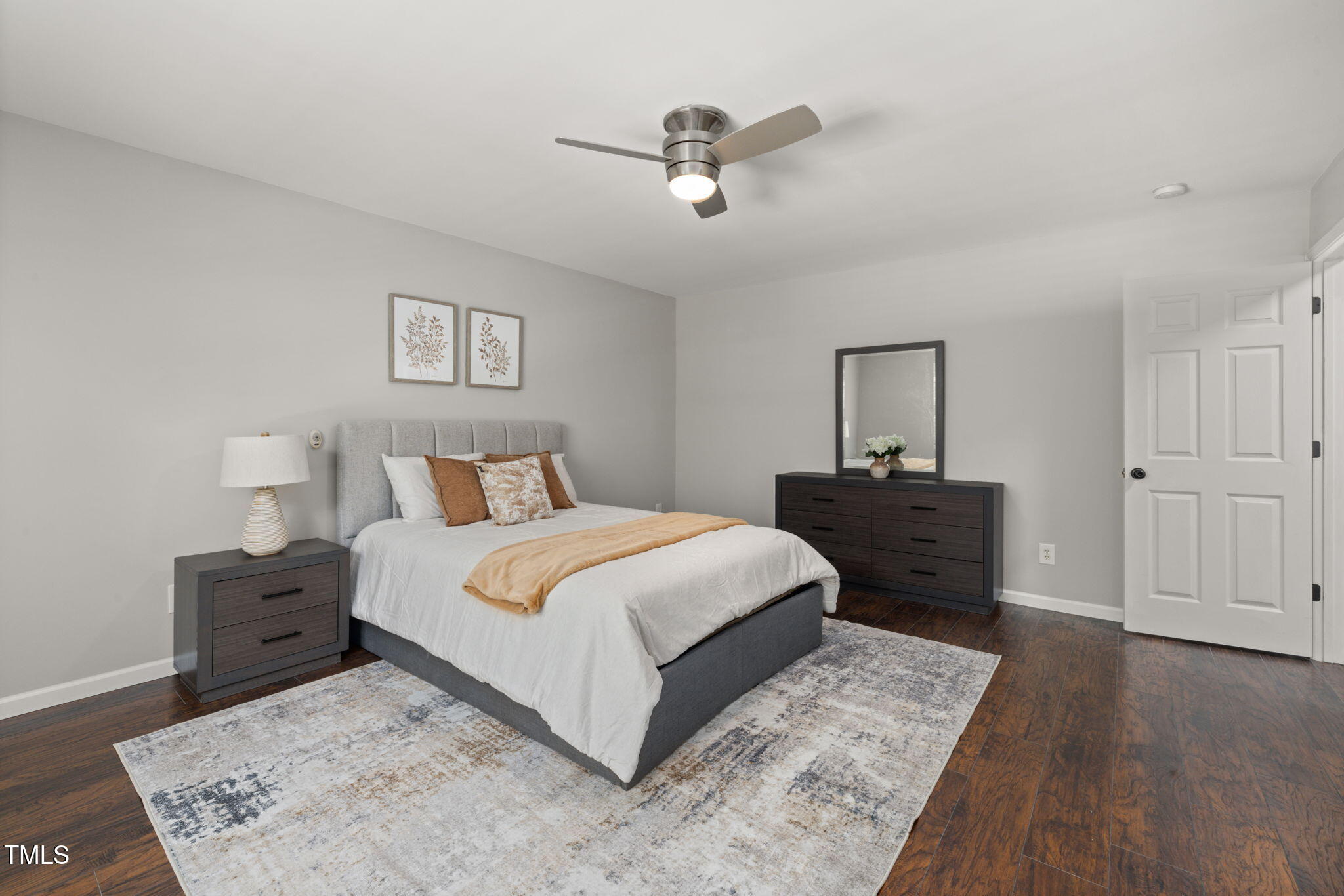 2701 Skybrook Lane Durham, NC 27703 - Photo 13 of 24 a bedroom with a bed and a dresser