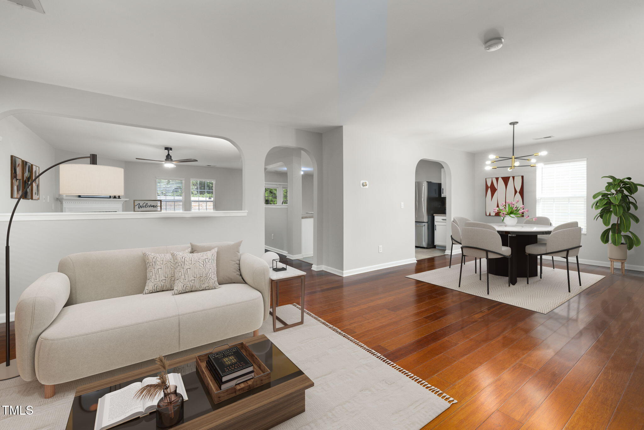 2701 Skybrook Lane Durham, NC 27703 - Photo 3 of 24 a living room with furniture and a wooden floor