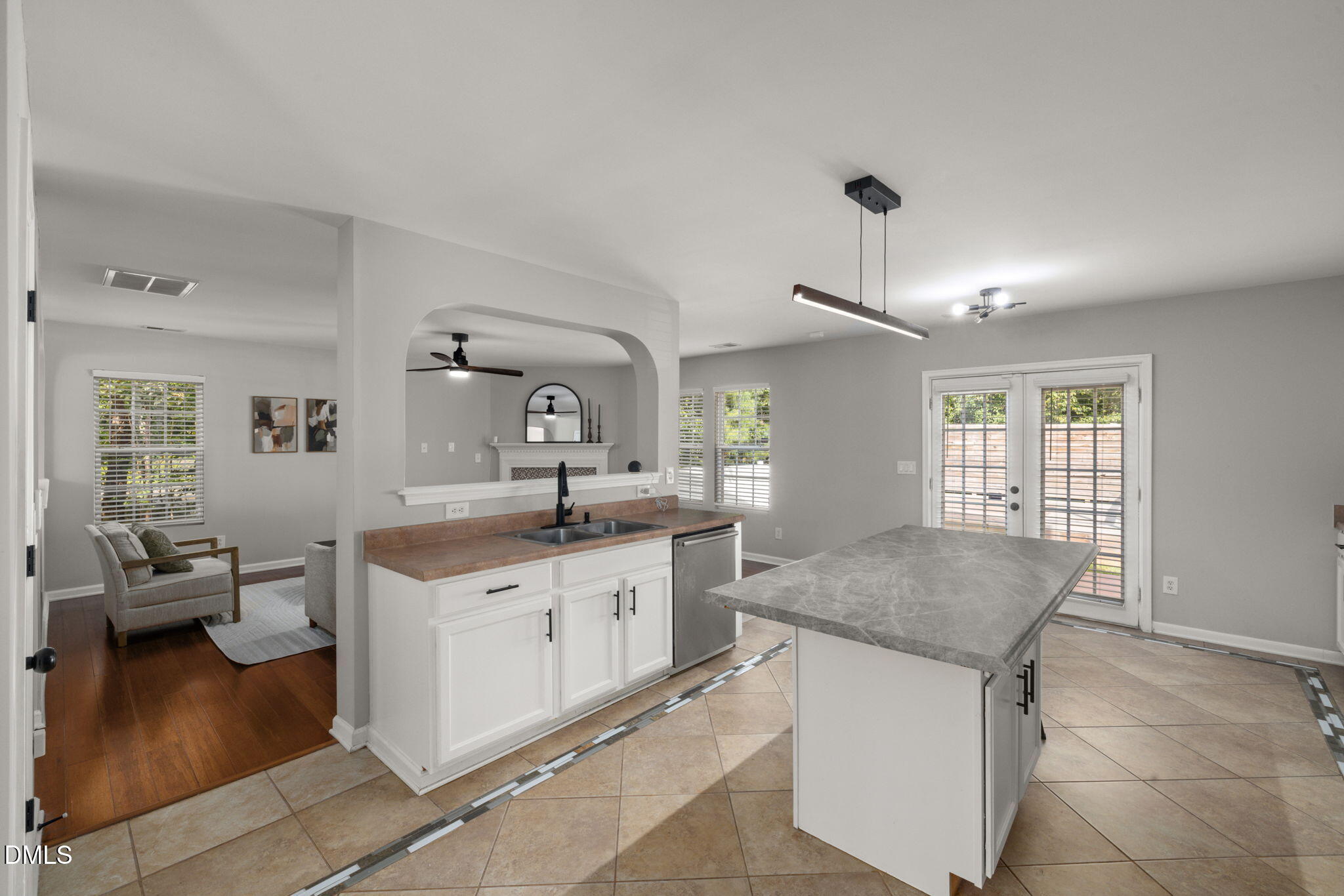 2701 Skybrook Lane Durham, NC 27703 - Photo 6 of 24 a kitchen with a sink and cabinets