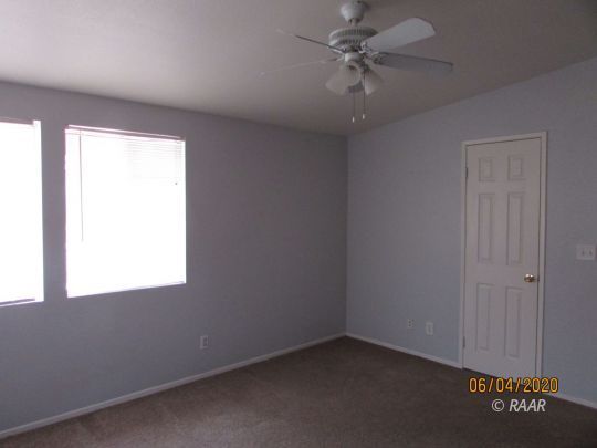 304 North Florence Street Ridgecrest, CA 93555 - Photo 8 of 21 an empty room with a window