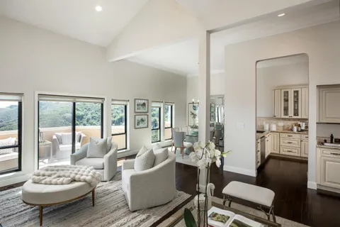 a living room with furniture and a table