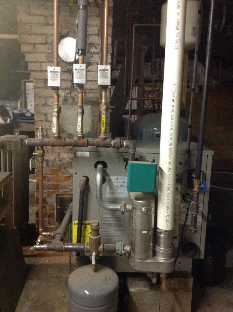11 Pearl Street Waterville, ME 04901 - Photo 14 of 19 11 Newer propane boiler