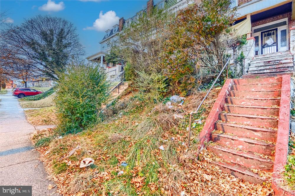 2521 Reisterstown Road Baltimore, MD 21217 - Photo 2 of 5 a view of a yard with plants and trees