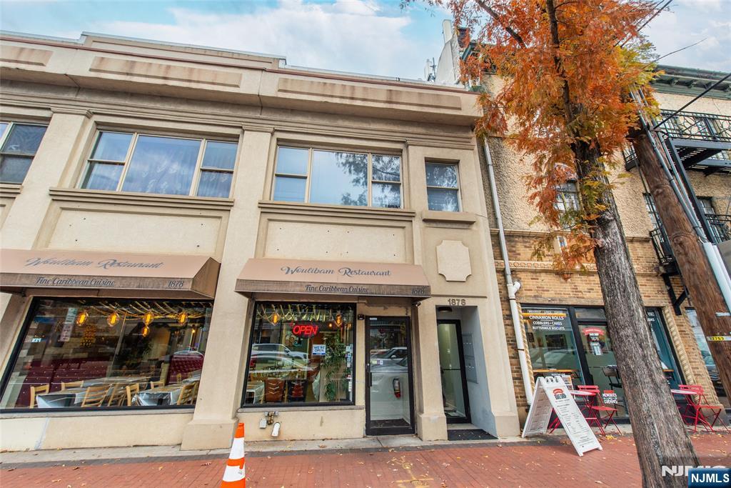 1878 Springfield Avenue, Unit 2B Maplewood, NJ 07040 - Photo 3 of 15 a view of a building with a window and door