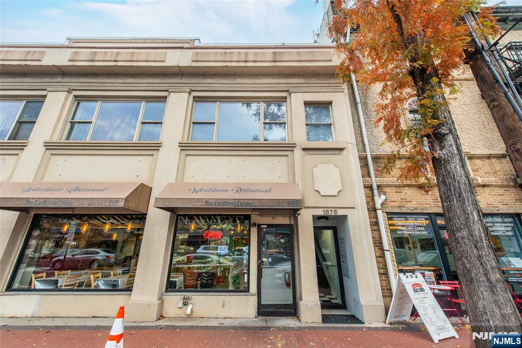1878 Springfield Avenue, Unit 2B Maplewood, NJ 07040 - Photo 4 of 15 a view of a building with a outdoor space