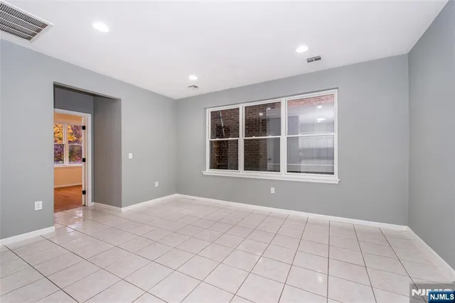 a kitchen with a refrigerator stove and microwave