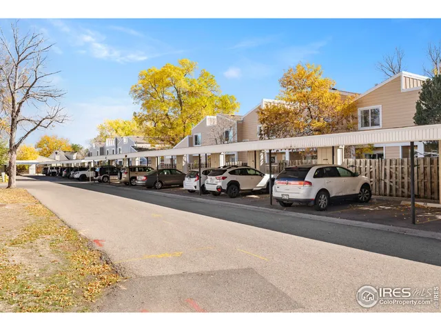a view of street with parked cars
