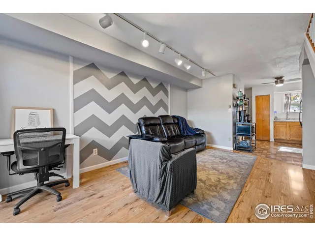 a kitchen with stainless steel appliances kitchen island granite countertop a stove and a sink