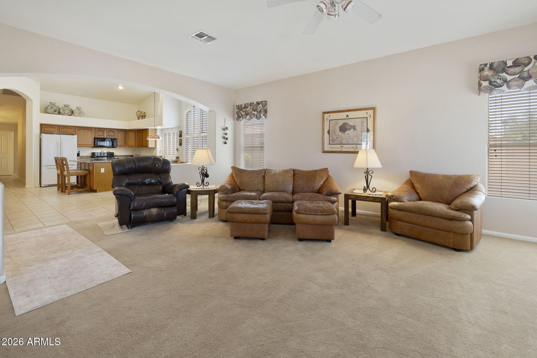 12435 West Monte Vista Road Avondale, AZ 85392 - Photo 27 of 69 a living room with furniture and a couch