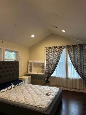 a view of kitchen with furniture and wooden floor