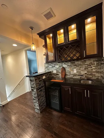 a bathroom with a bathtub and a sink