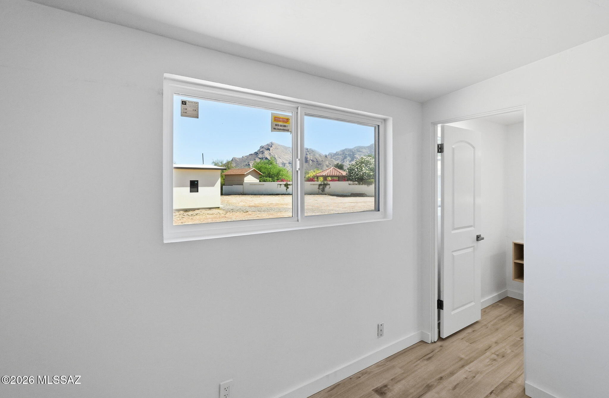 950 West Ina Road Tucson, AZ 85704 - Photo 24 of 54 a view of a room that has a window in it