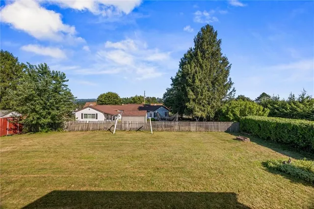 a view of a swimming pool with an ocean view