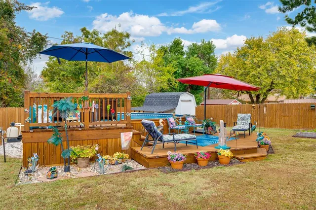 a view of a swimming pool with a patio