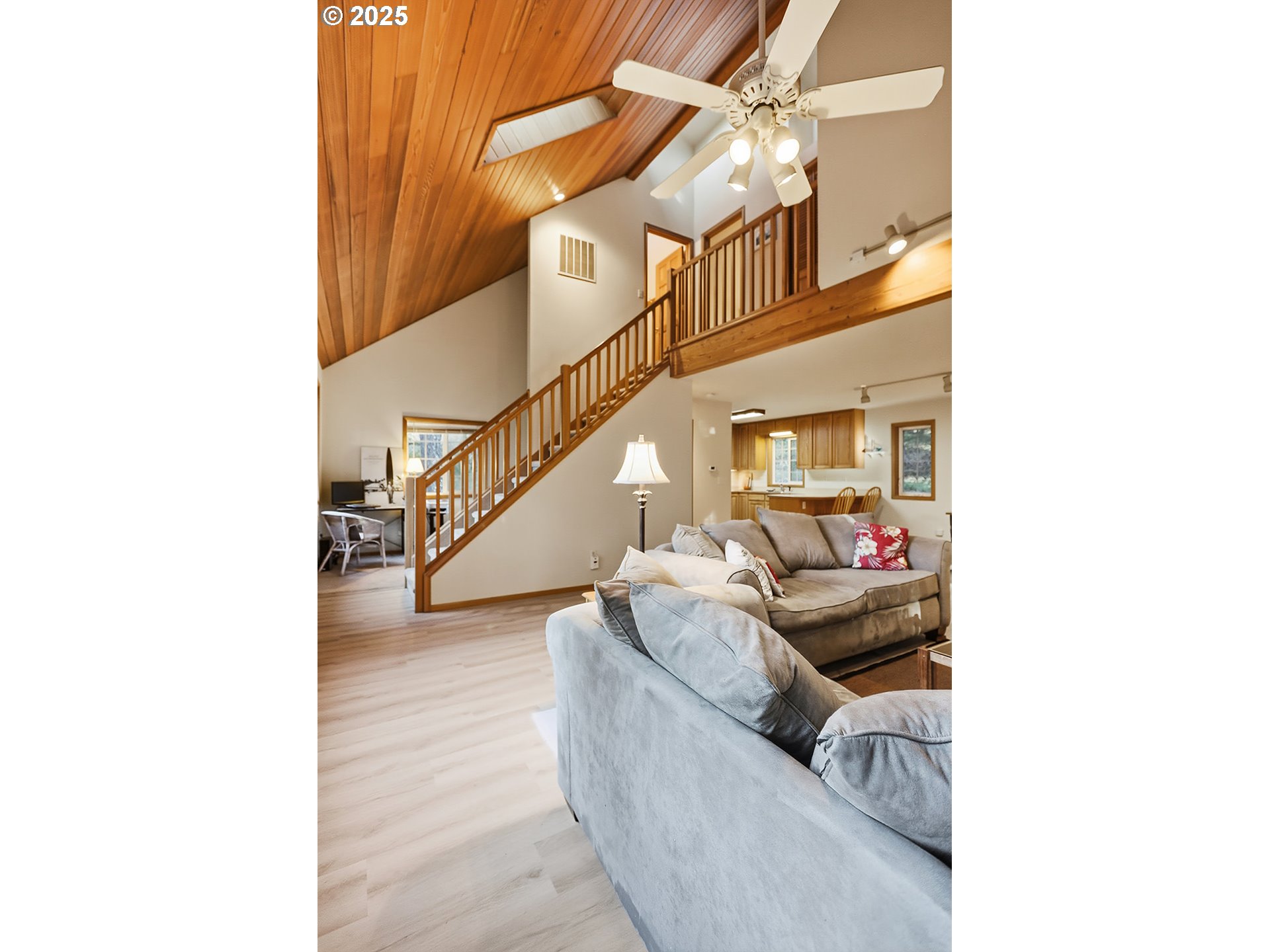 80 Echo Glen Road White Salmon, WA 98672 - Photo 17 of 48 a living room with furniture and stairs