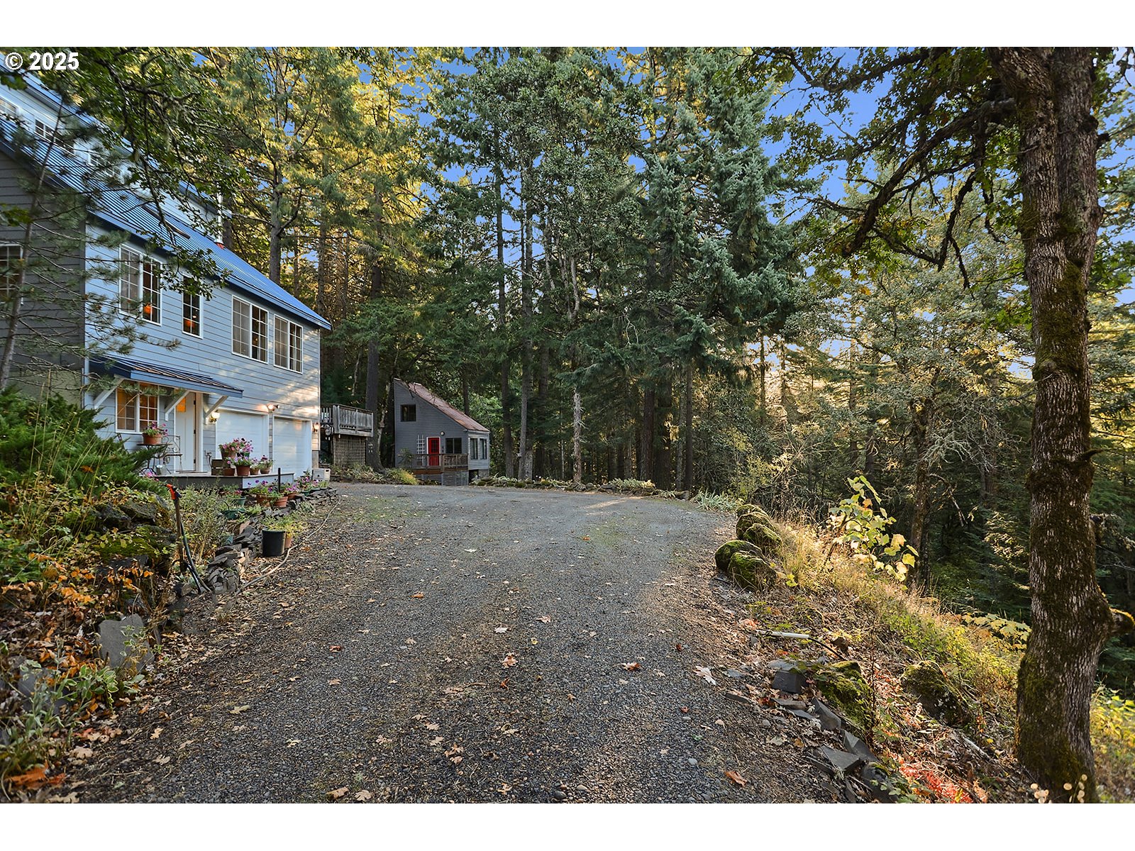 80 Echo Glen Road White Salmon, WA 98672 - Photo 2 of 48 a view of a yard in front of a house