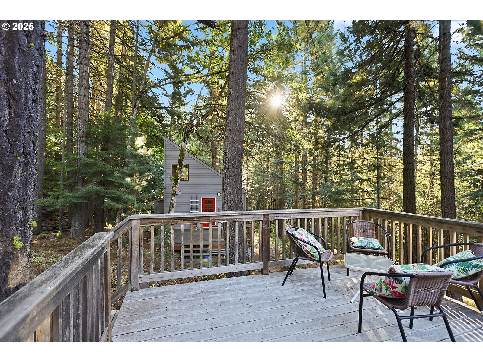 80 Echo Glen Road White Salmon, WA 98672 - Photo 33 of 48 a view of a wooden deck with furniture