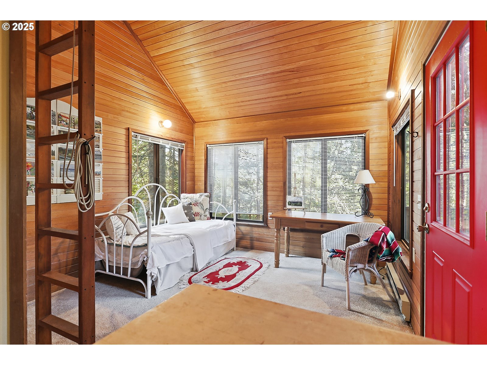 80 Echo Glen Road White Salmon, WA 98672 - Photo 41 of 48 a bedroom with furniture and a large window