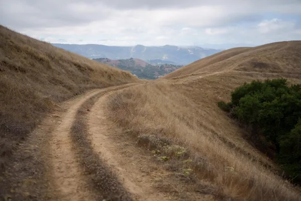 a view of mountain view with mountains in the background