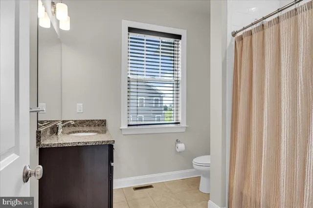 a bedroom with a bed and furniture