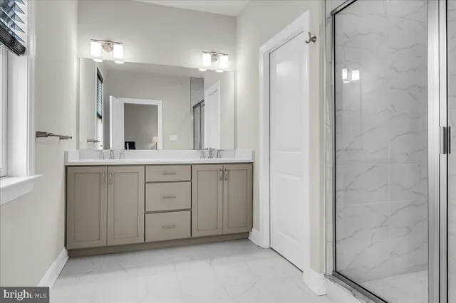 a view of a lake with boats and trees in the background