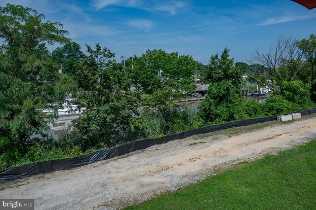 a view of balcony with wooden floor