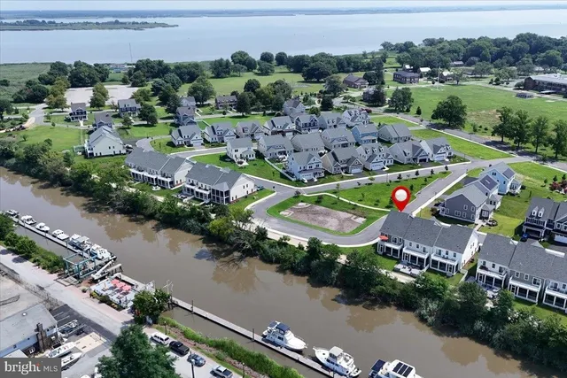 an aerial view of a house with a garden