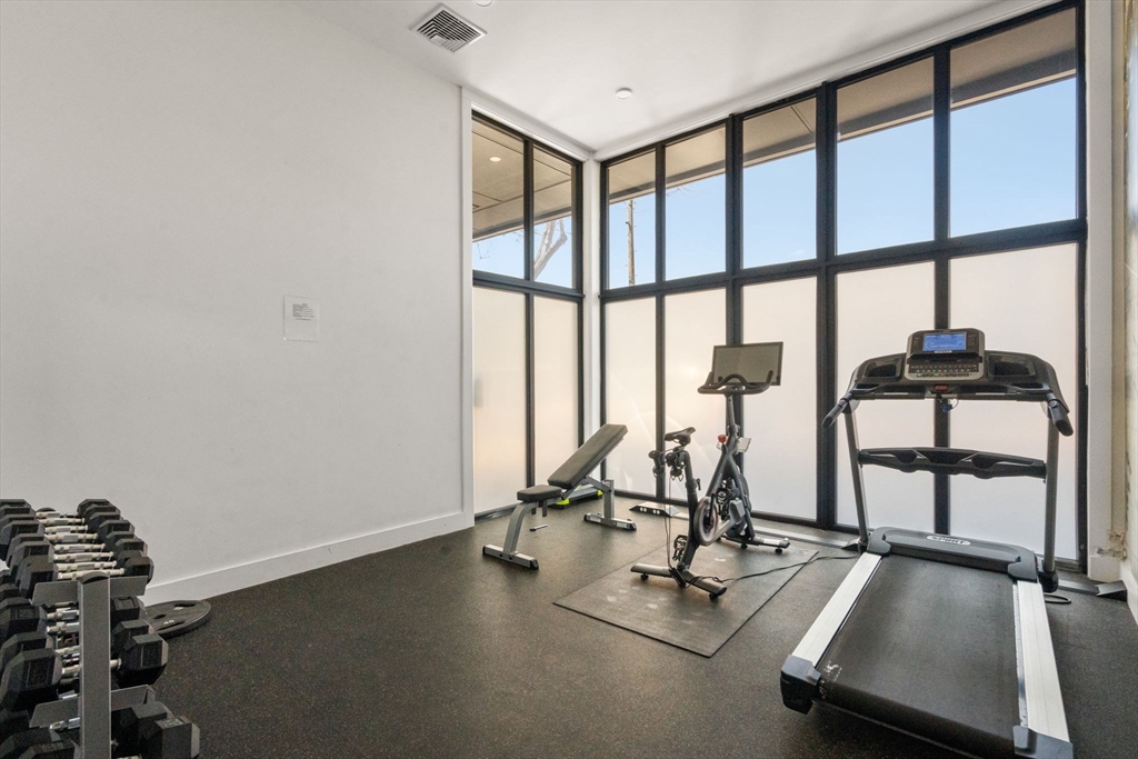 30 Penniman Road, Unit 506 Boston, MA 02134 - Photo 19 of 25 a view of a room with gym equipment