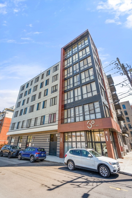 30 Penniman Road, Unit 506 Boston, MA 02134 - Photo 23 of 25 a front view of a building